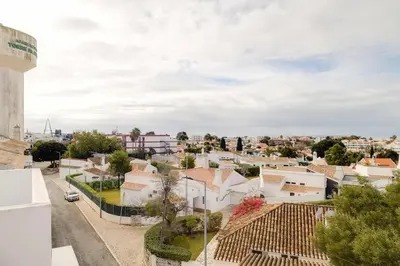 arial view of a city with white buildings at ELI FLAT just few steps from the Strip in Albufeira in Albufeira