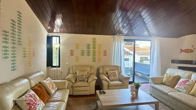 a living room with couches and a table at Vilanova by Check-in Portugal in Albufeira