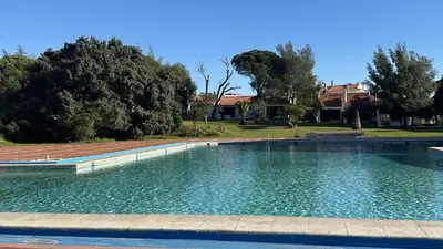 a large pool of water in a yard at Vilanova by Check-in Portugal in Albufeira