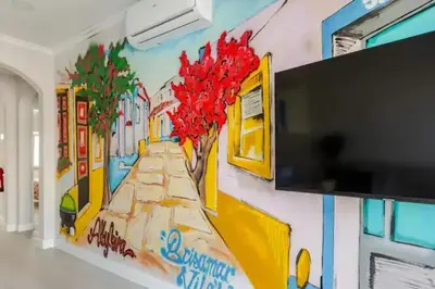 a mural on a wall in a room at BrisaMarVilas Sea view, 5 min Walk to Town & Beach 12e13 in Albufeira