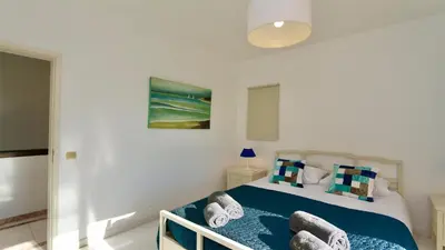 a bathroom with a toilet and a tub and a sink at Villa Den, private pool villa, Sleeps 6 adults and 2 children, CD 304 - Cleverdetails in Vilamoura
