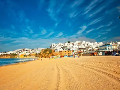 a view of a beach with buildings in the background at Holiday Home V3 Falésia - Vip Properties by Interhome in Roja- Pé