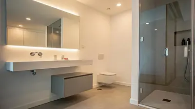 a bathroom with a sink and a shower at Algarve Villa for Contemporary Design & Sea Views in Albufeira