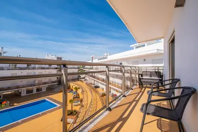 a balcony with a view of an amusement park at Solarium Luxury Apartment by Atlantic Places in Albufeira