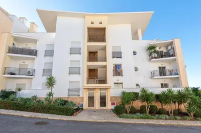 an aerial view of a beach and the ocean at BnB Homes White Rose Garden Apartment with 2 Terraces & 2 Swimming Pools in Albufeira