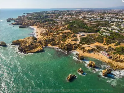 an aerial view of a beach with rocks at Ocean Vista Retreat with Beach & Pool Access by Drago Rentals in Albufeira