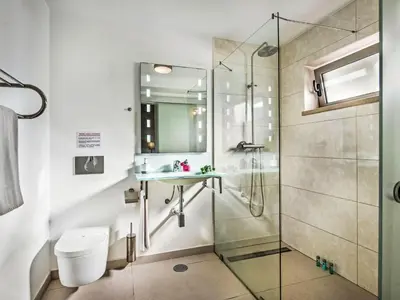 a bathroom with a sink and a shower at Holiday Home Praia V5 VIP Properties by Interhome in Vilamoura