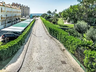 a road with a car parked on it at Holiday Home Praia V5 VIP Properties by Interhome in Vilamoura