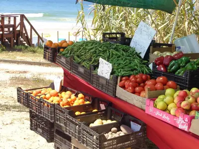 a display of fruits and vegetables at a market at Sunshine by Check-in Portugal in Albufeira