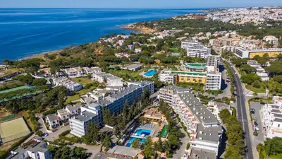 an aerial view of a city and the ocean at Balaia Project by LovelyStay in Olhos de Água