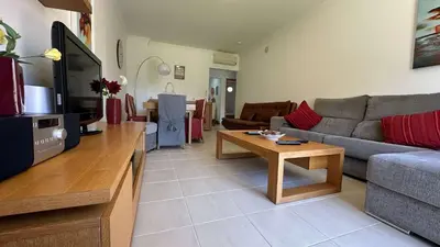 a living room with a couch and a table at Apartment Josefa in Albufeira
