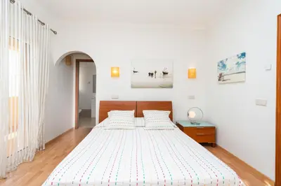 a room with two beds at Casa da Praia by OCvillas in Albufeira