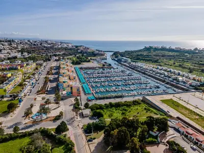 an aerial view of a large parking lot with boats at Marina 3B 1B By AL in Albufeira