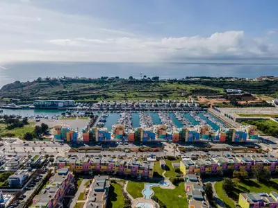 an aerial view of a marina with many buildings at Marina 4B 1D By RS in Albufeira