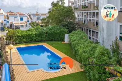 a bunk bed with a sign that says home holidays at #290 Families Only - Choro Azul by Home Holidays in Albufeira