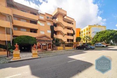a building on the side of a street at Casablanca - Dream Lodging in Albufeira