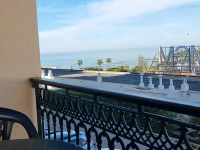 a view of the ocean and a roller coaster at Mar à Vista Apartment in Albufeira