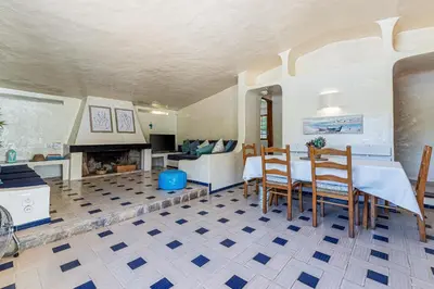 a swimming pool in a yard with alatable at Casa Charlotte na Quinta da Balaia in Albufeira