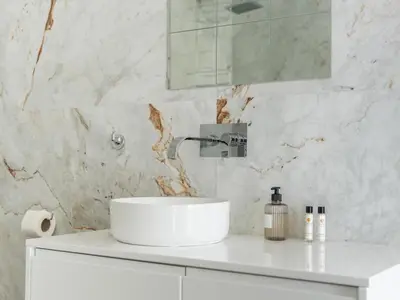 a bathroom with a white sink and a mirror at Eco Residence 05 House by Stay ici Algarve Holiday Rental in Albufeira