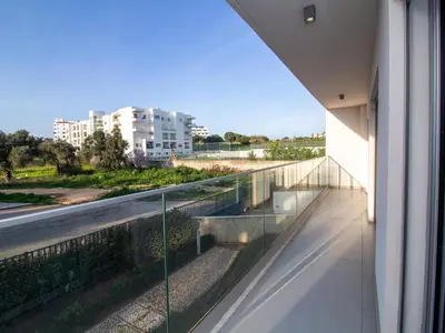 a view from the balcony of a building at Green 3 Apartment by Stay ici Algarve Holiday Rental in Albufeira