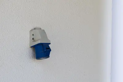 a blue object is hanging on a wall at Casa Coelho in Albufeira