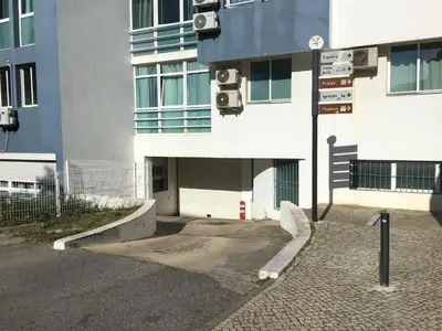 a street sign in front of a building at Old Town, Bay View Apartment in Albufeira