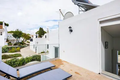 a view from the balcony of a white house at Casa Bella in Loulé