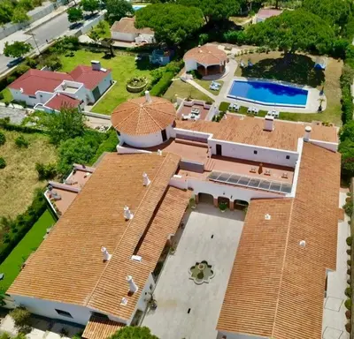 an aerial view of a large house with a swimming pool at SOLAR Do MONTE 2 in Albufeira