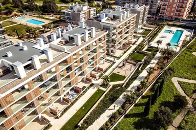 an aerial view of a building with a pool at Green View Studio with Pool in Albufeira