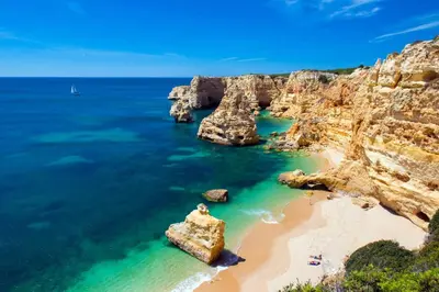 a view of a beach with rocks in the water at Villa SOLAR DO MONTE 3 in Albufeira