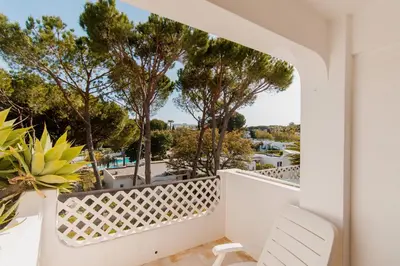 a view from the balcony of a villa at Acolhedor Apt T1, vista piscina , Balaia Golf Village in Albufeira