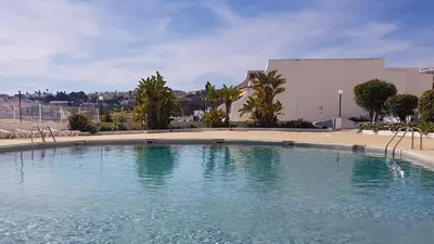 a large pool of water in front of a building at Albufeira, Blue Wave Retreat 65 in Albufeira