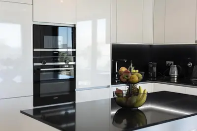 a kitchen with a sink with fruit on it at Terracos de Quarteira II White by Real Properties in Cavacos