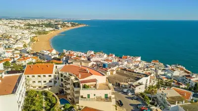 an aerial view of a town next to the ocean at Hofnar Sea View Apartment in Albufeira