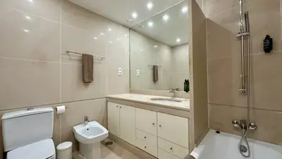 a bathroom with a toilet and a sink and a shower at Ocean Drive by Check-in Portugal in Albufeira