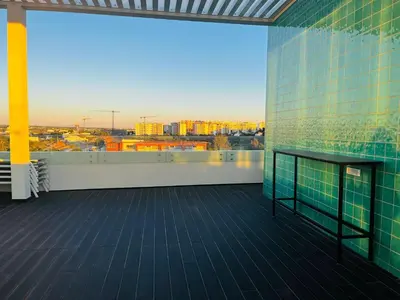 a balcony with a view of a city at TAC - Alma Apartment in Faro