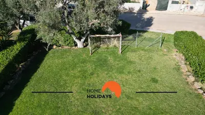 an image of a yard with a goal on the grass at #293 Clube Albufeira 309 by Home Holidays in Albufeira