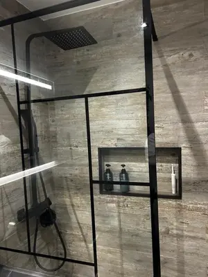 a bathroom with a sink and a toilet and a mirror at Quarteira Beach Home Haven in Quarteira