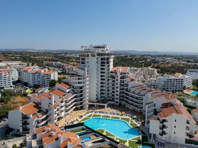 an aerial view of an apartment complex with a swimming pool at Apartment Villa Magna by Interhome in Albufeira