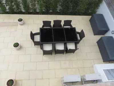an overhead view of a table and chairs on a patio at Luxury Villa with Private pool walking distance to beach and Marina in Quarteira