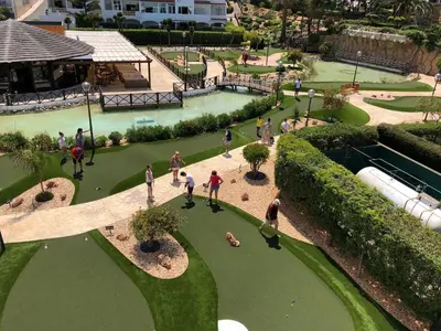 an overhead view of a park with people playing golf at Amazing ApartHotel Apartments 2 Bedroom in Albufeira in Albufeira