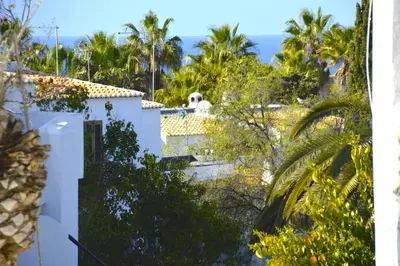 a view of the ocean from the roof of a house at Apartamento de 2 quartos Hibiscus 40A na Praia de Sao Rafael - Albufeira, Algarve in Albufeira