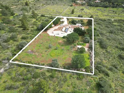 an overhead view of a house in a field at Casa Alfarroba - with heated indoor pool in Algoz