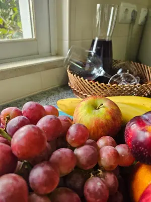 a pile of fruit sitting on a counter next to a window at Vilamoura - VILLA LIMONI in Vilamoura