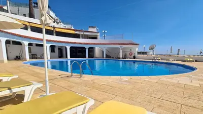 a swimming pool on the side of a cruise ship at Albufeira, Blue Wave Retreat 64 in Albufeira