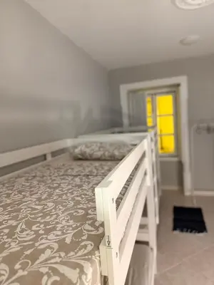 a bedroom with a bed in a room at Faro Coast Guest House in Faro