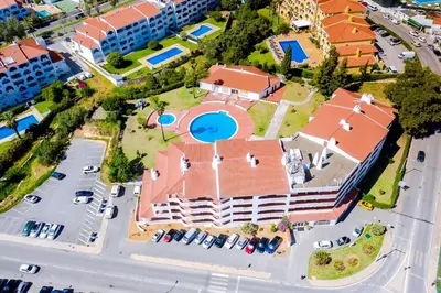 an aerial view of a building with a pool at Valmangude - Collection design par Enjoyyourstay in Albufeira