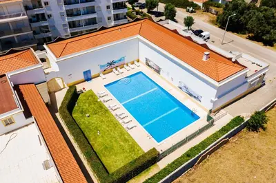 an overhead view of a house with a swimming pool at Falesia beach Pool quiet side by Enjoyyourstay in Albufeira