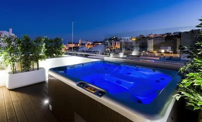 a blue tub sitting on top of a balcony at D_Loft Downtown in Albufeira