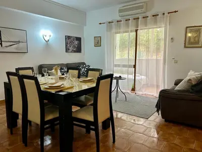 a dining room with a table and chairs at OldTownPool Albufeira in Albufeira